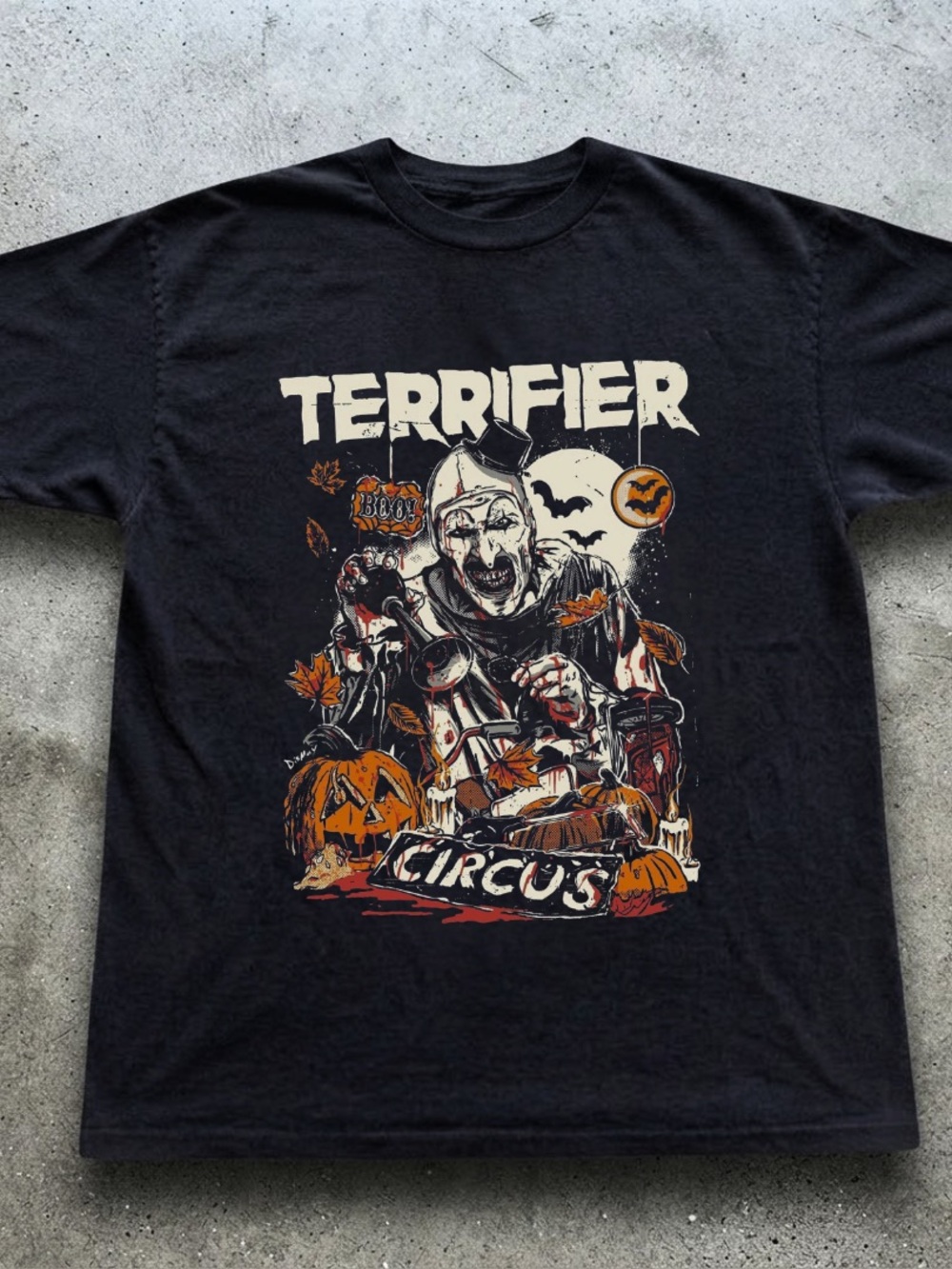 Terrifier Circus Graphic Tee - Black with Orange Accents Art the clown’s
